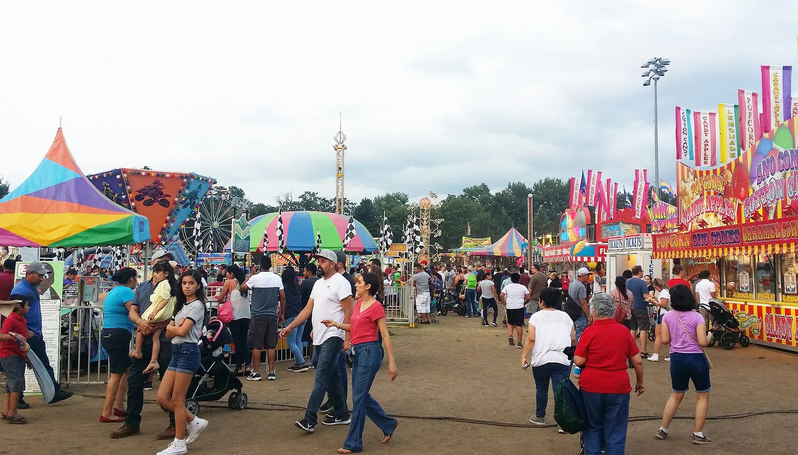The midway, with rides, game booths and food stands, at the Arlington County Fair at Thomas Jefferson Community Center and Park in Arlington.