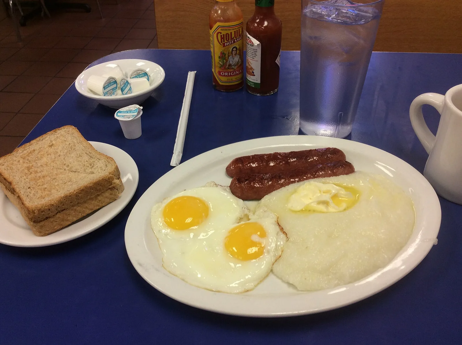 Eggs, grits and a half-smoke sausage for breakfast at the Bob & Edith's Diner in Springfield, Virginia.