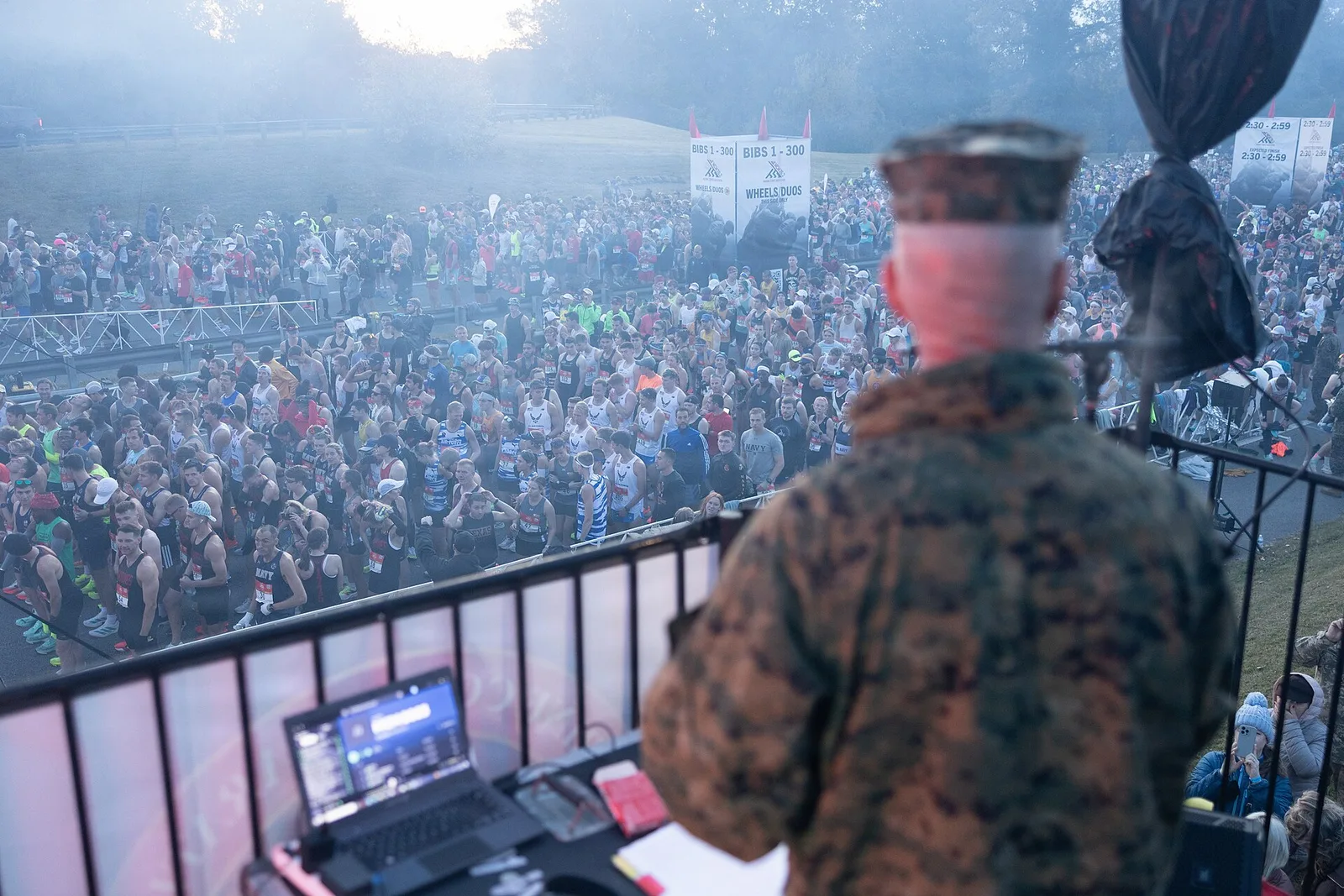 Runners wait at the start of the Marine Corps Marathon in Arlington, Va.