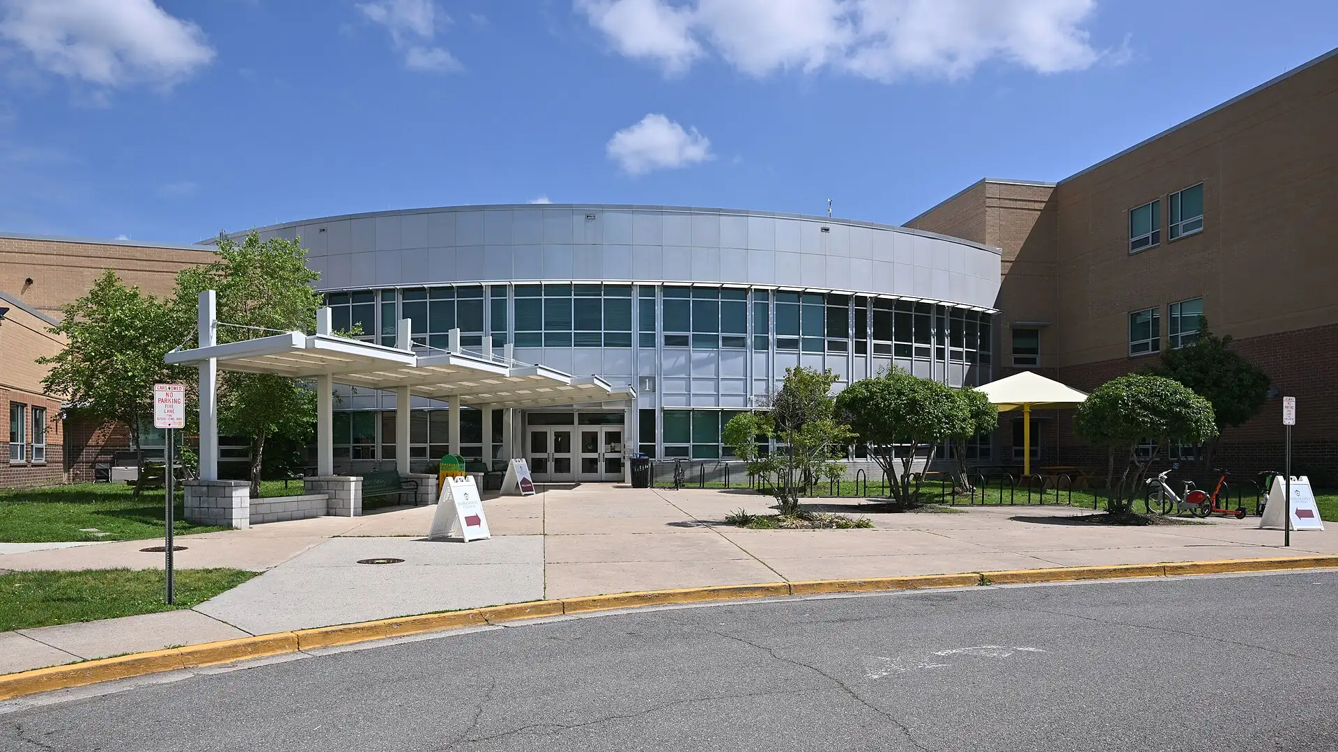 The main entrance to Kenmore Middle School on South Carlin Springs Road, one of 38 Arlington Public Schools schools and programs listed here.