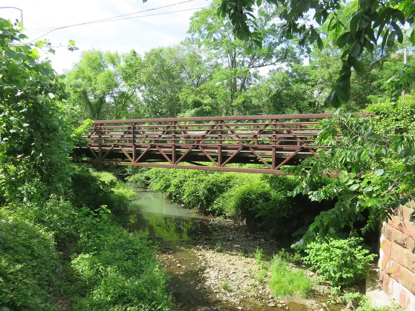 The W&OD Trail bridge over Four Mile Run near Little Falls Road, a little over a mile southwest of Nottingham Elementary.